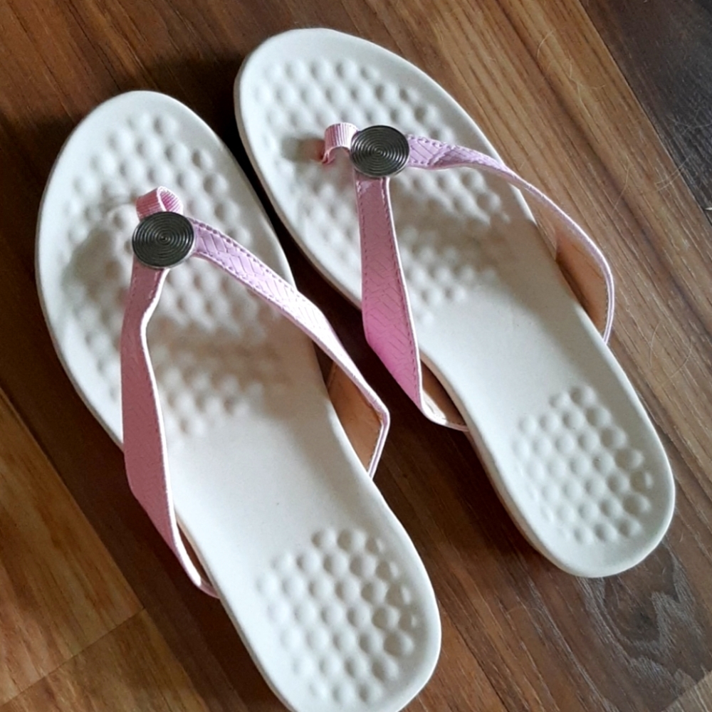 Flip flops. Never worn.